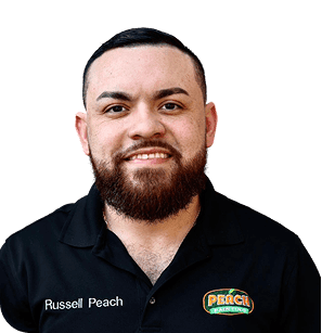 Owner of Peach Painting wearing his uniform.